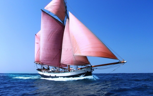 The blue sea sails the sail Stock Photo