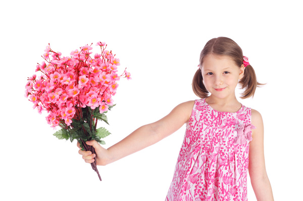 The little girl holding a flower Stock Photo