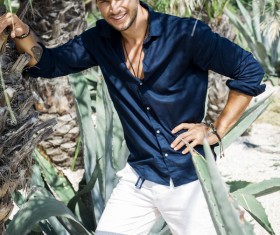 The palm trees under the shade of a man Stock Photo 05