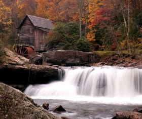 The water mill on the stream Stock Photo