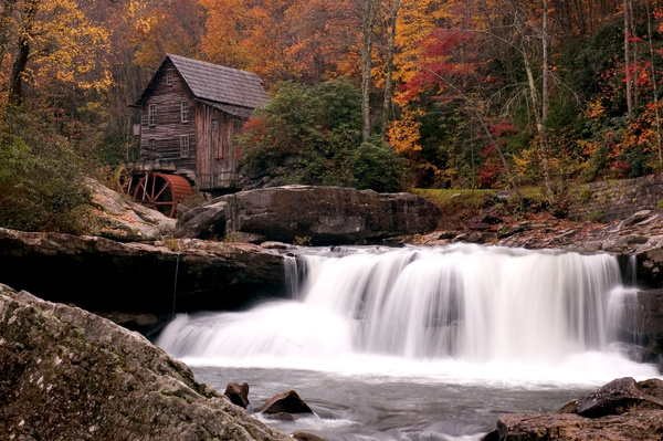 The water mill on the stream Stock Photo
