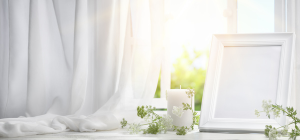 The windowsill candles and frames Stock Photo