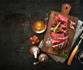 Undercooked meat and spices on the chopping block Stock Photo 04