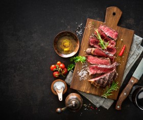 Undercooked meat and spices on the chopping block Stock Photo 05