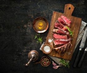 Undercooked meat and spices on the chopping block Stock Photo 06