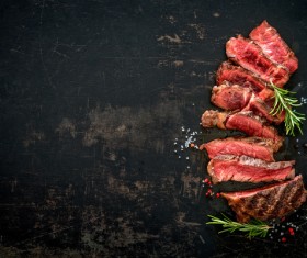 Undercooked meat and spices on the chopping block Stock Photo 07