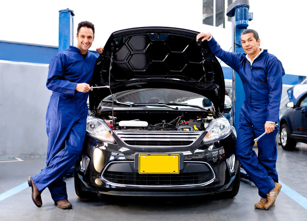 Vehicle maintenance workers Stock Photo