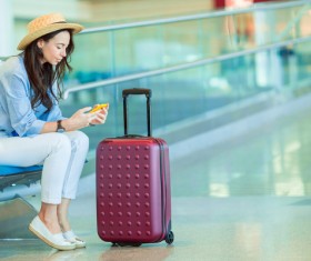 Waiting room to see the smart phone passengers Stock Photo 03
