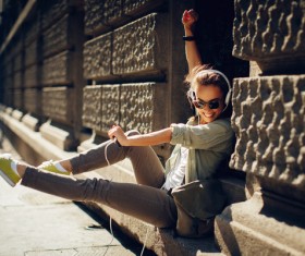 Wearing headphones listening to music young girl Stock Photo 01