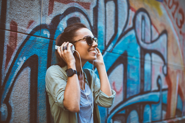 Wearing headphones listening to music young girl Stock Photo 05