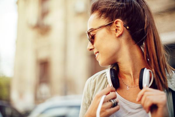Wearing headphones listening to music young girl Stock Photo 06
