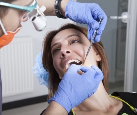 Woman doing dental care Stock Photo 02