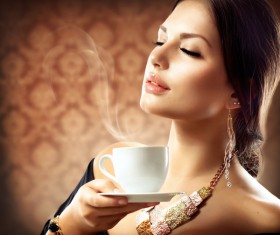 Woman holding a coffee cup Stock Photo