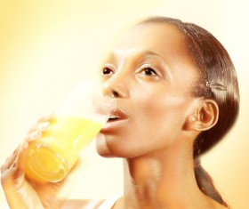 Women drink fruit juice Stock Photo 01
