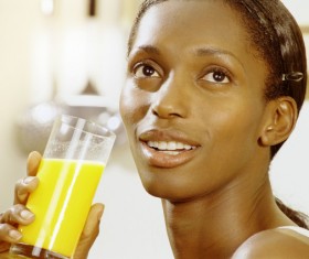 Women drink fruit juice Stock Photo 02