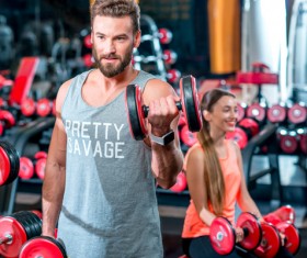 Workout in the gym for men and women Stock Photo 02