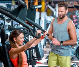 Workout in the gym for men and women Stock Photo 06