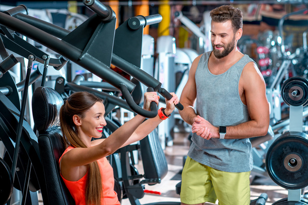 Workout in the gym for men and women Stock Photo 06