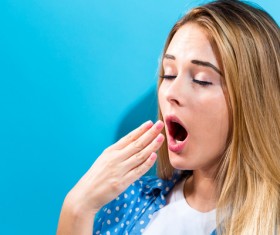 Yawned woman Stock Photo