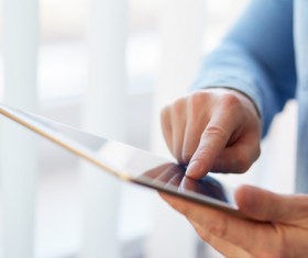 businessman using a tablet PC Stock Photo 01