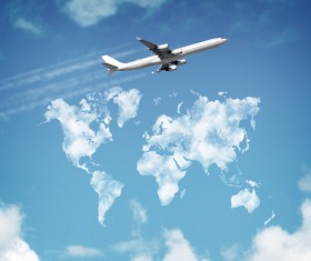 A passenger plane flying under the blue sky Stock Photo