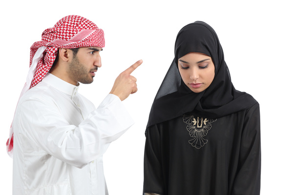 Arab man accused his wife Stock Photo