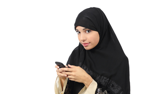 Arab woman to play smart phones Stock Photo