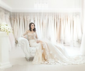 Beautiful bride with elegant white dress Stock Photo