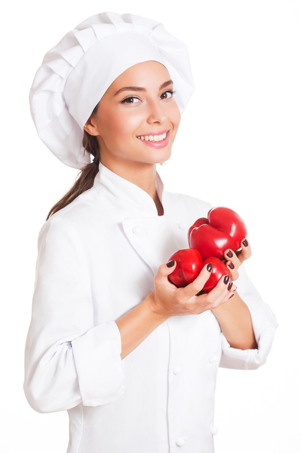 Beautiful female chef holding a tomato Stock Photo 01