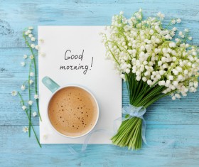 Bluebells and coffee on the table Stock Photo