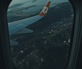 City scenery through airplane window Stock Photo