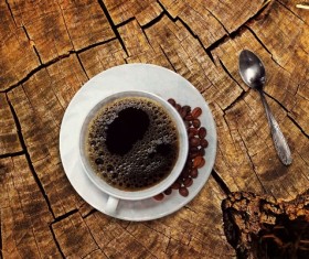 Coffee on a wooden cracked table Stock Photo