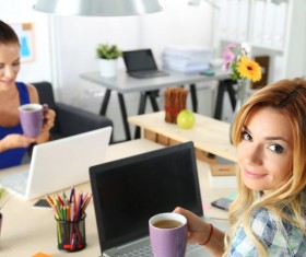 Coffee on the desktop with people using the computer Stock Photo 02