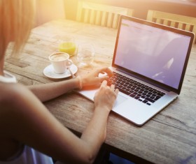 Coffee on the desktop with people using the computer Stock Photo 05