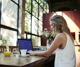 Coffee on the desktop with people using the computer Stock Photo 06