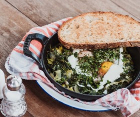 Delicious traditional breakfast with eggs and bread Stock Photo