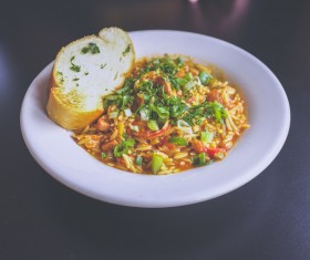 Delicious traditional dish with rice and bread Stock Photo