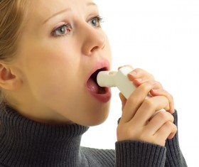 Detecting the temperature of girl Stock Photo