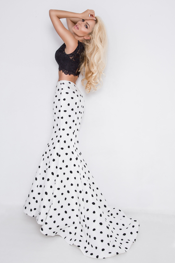 Dressed in spotted skirt beautiful slim blonde woman Stock Photo 04