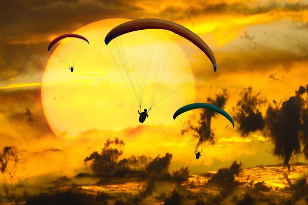 Flying paragliding Stock Photo