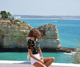 Girl watching the sea Stock Photo