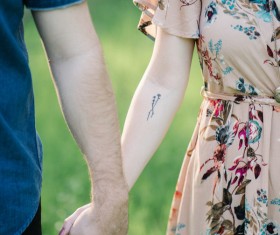 Happy caucasian couple with hand in hand Stock Photo