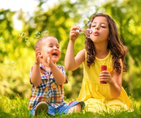 Happy play siblings Stock Photo