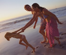 Holding the little girl hand parents Stock Photo