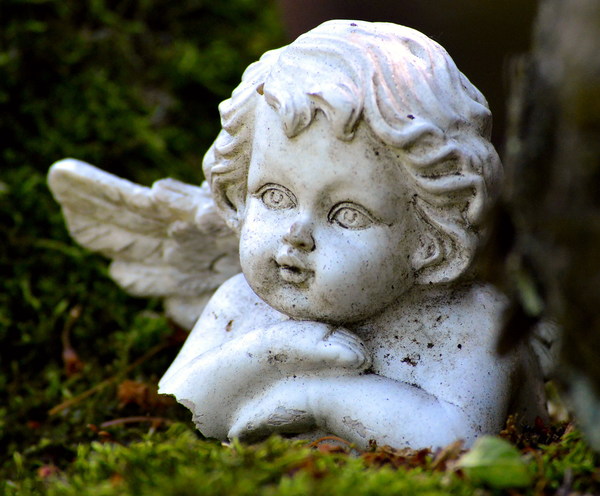 Little angel stone statue Stock Photo