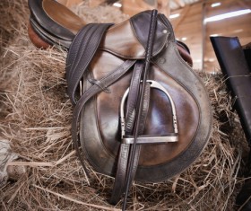 Saddle on a haystack Stock Photo
