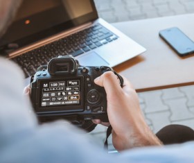 Setting digital camera man Stock Photo