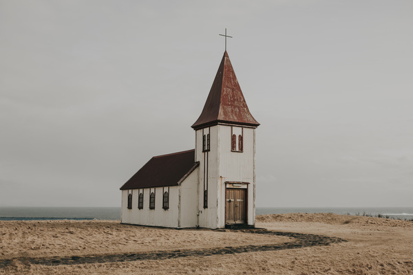Simple church on seaside scene Stock Photo