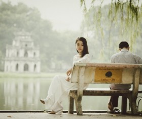 Sitting in a chair to rest on men and women Stock Photo
