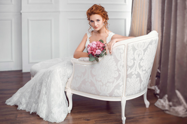 Sitting on the chair of the beautiful bride Stock Photo